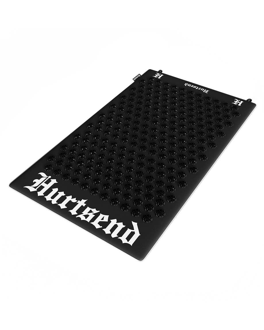 hurtsend deathmat front shot showing black rose spikes for reducing stress and aiding recovery