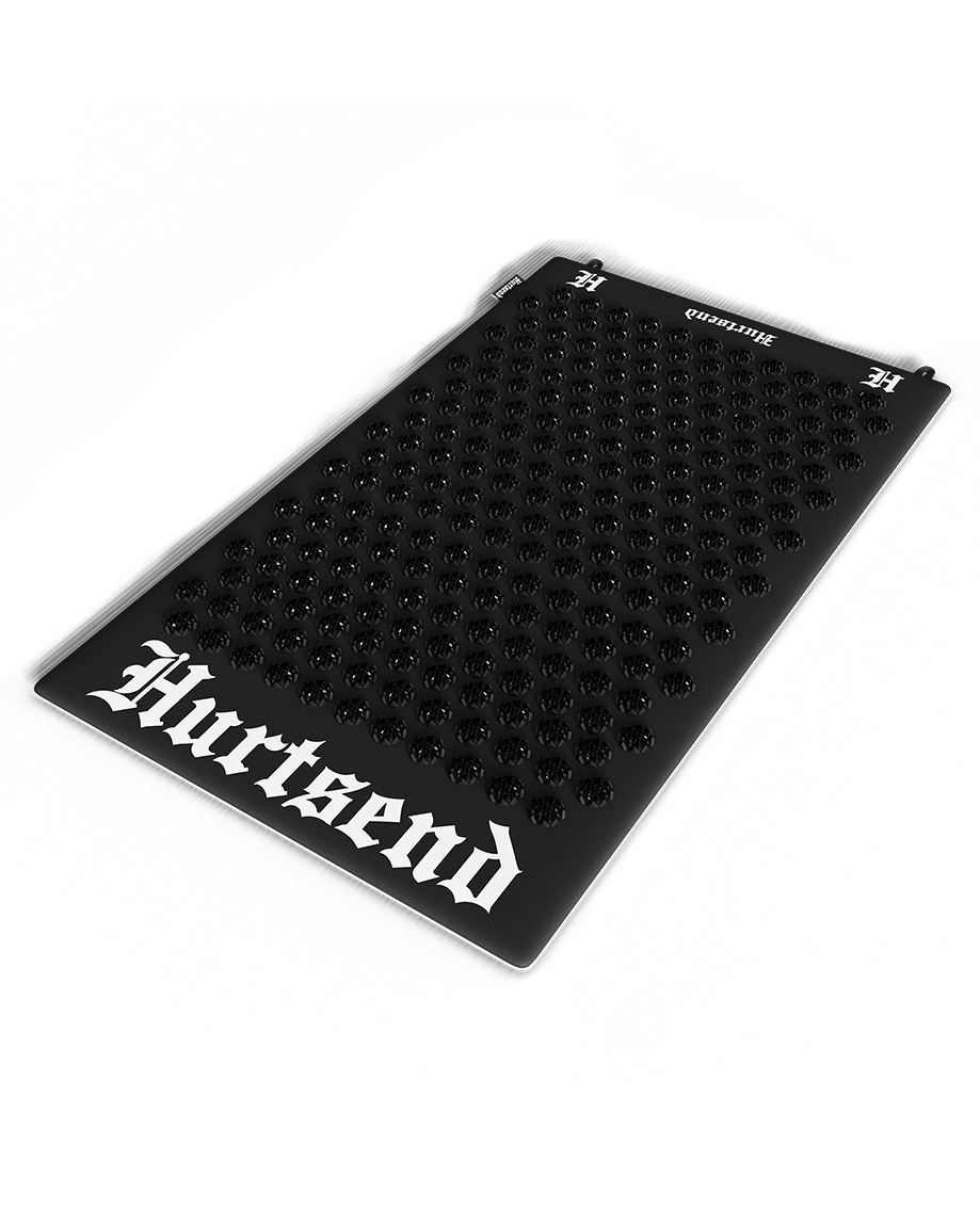 hurtsend deathmat front shot showing black rose spikes for reducing stress and aiding recovery