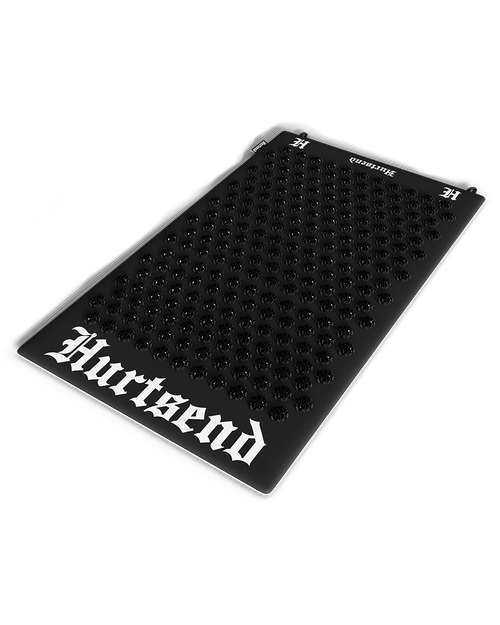 hurtsend deathmat front shot showing black rose spikes for reducing stress and aiding recovery